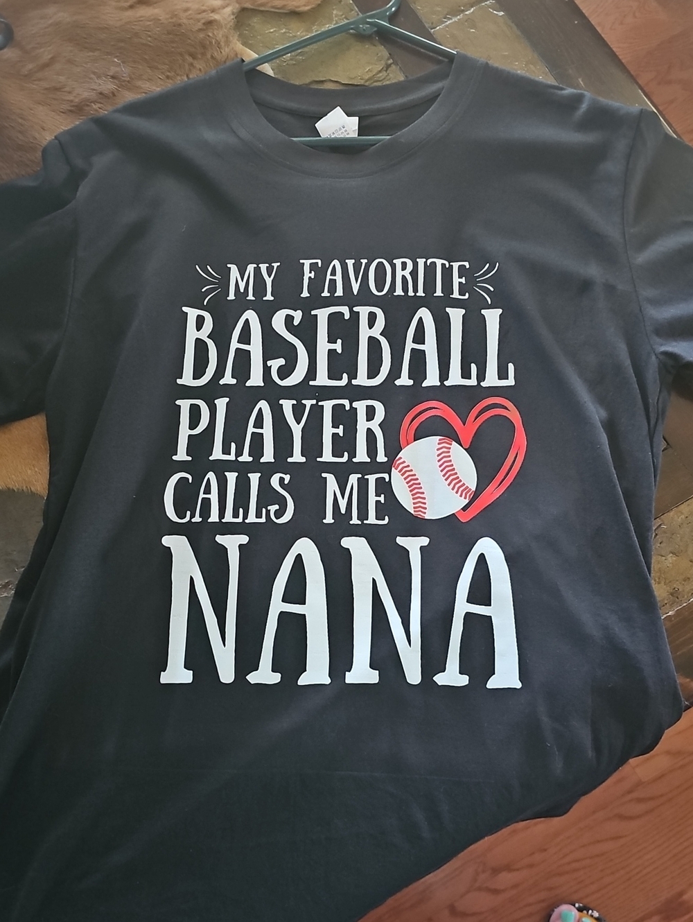 My Favorite Baseball Player Calls Me Nana Kids Black Tee